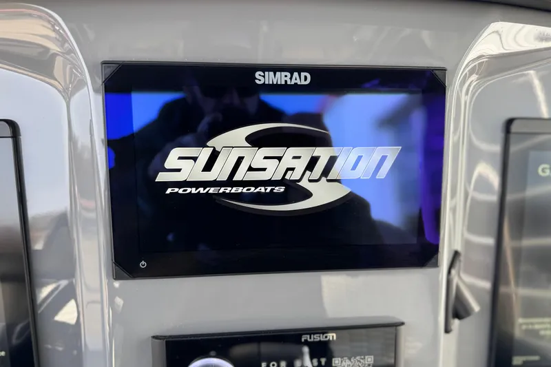 Slide: The Image of Simrad display on 2026 Sunsation 32 CCX powerboat dashboard. - 27