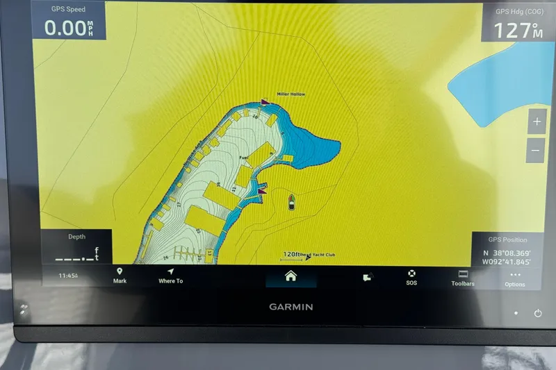 Slide: The Image of Garmin GPS display on 2026 Sunsation 32 CCX boat, showing navigation map and coordinates. - 29