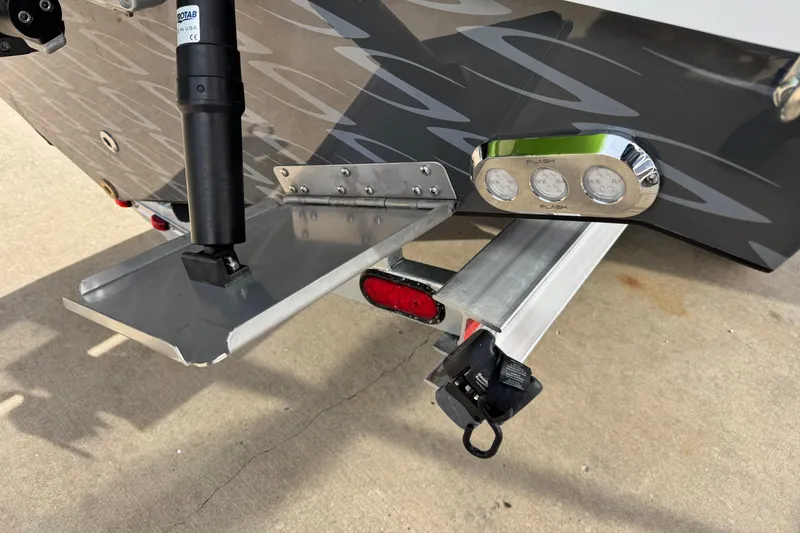 Slide: The Image of 2026 Sunsation 32 CCX boat with trim tab and LED lights detail. - 7