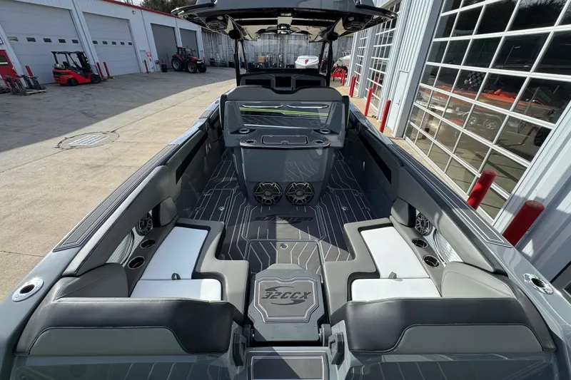 Slide: The Image of 2026 Sunsation 32 CCX boat interior with sleek seating and modern design. - 9