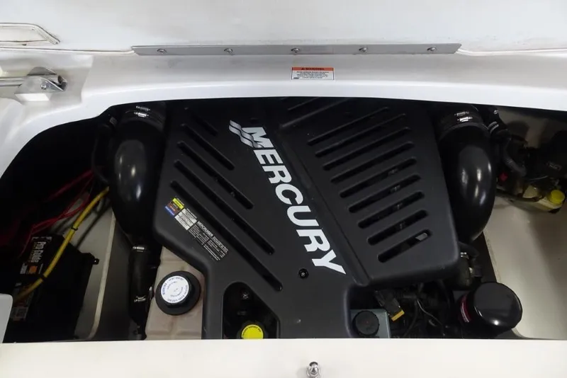 Slide: The Image of Engine compartment of a 2008 Crownline 23 SS boat with Mercury engine. - 17