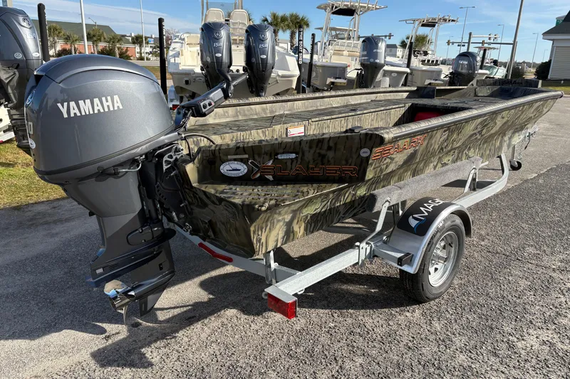 Slide: The Image of 2026 SeaArk 1752 Slayer X boat with Yamaha motor on trailer. - 4