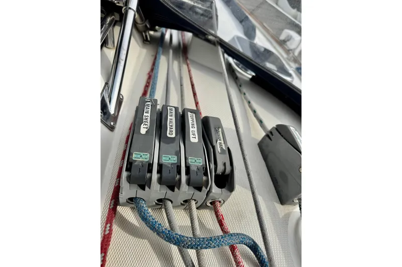 Slide: The Image of Close-up of sailboat rigging lines and clutches on a 2000 Sabre 402 yacht. - 18
