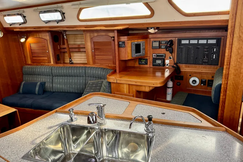 Slide: The Image of Interior of a 2000 Sabre 402 yacht with wood finish and modern amenities. - 36