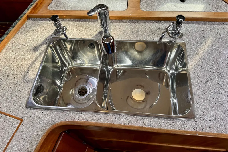 Slide: The Image of Stainless steel double sink on Sabre 402 yacht, 2000 model, with modern fixtures. - 37