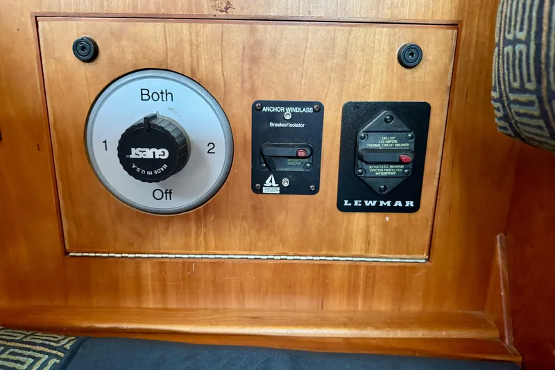 Slide: The Image of Control panel of a 2000 Sabre 402 boat featuring Guest and Lewmar components. - 44
