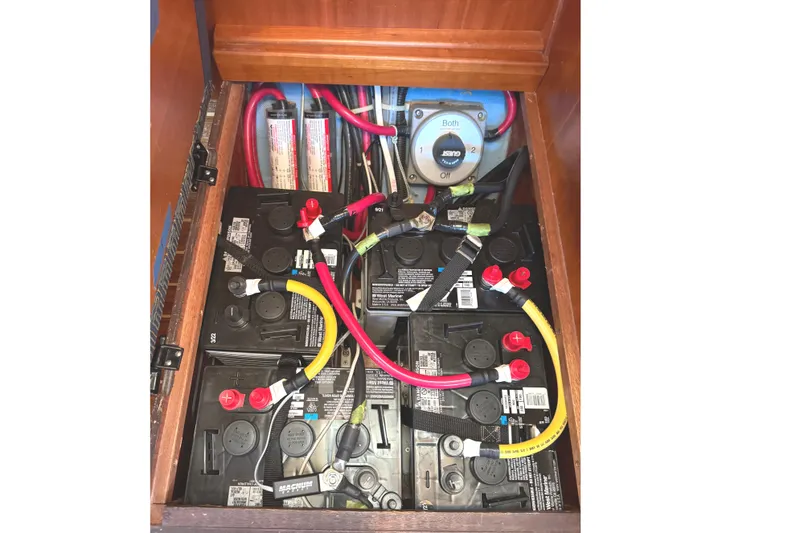 Slide: The Image of Battery compartment of a 2000 Sabre 402 with wiring and switch. - 51