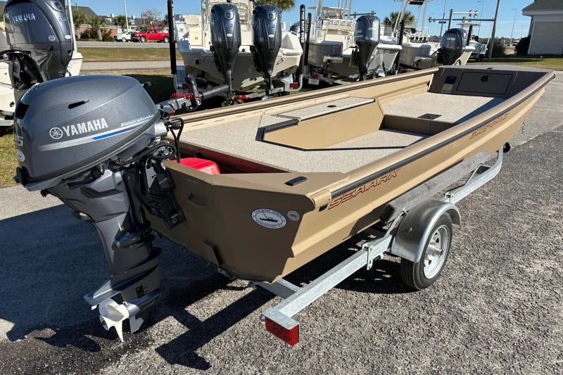 Slide: The Image of 2026 SeaArk DXS 1548 DKLD boat with Yamaha outboard motor on trailer. - 4