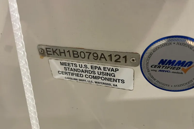 Slide: The Image of 2021 Carolina Skiff 162 JLS certification labels and serial number plate. - 10