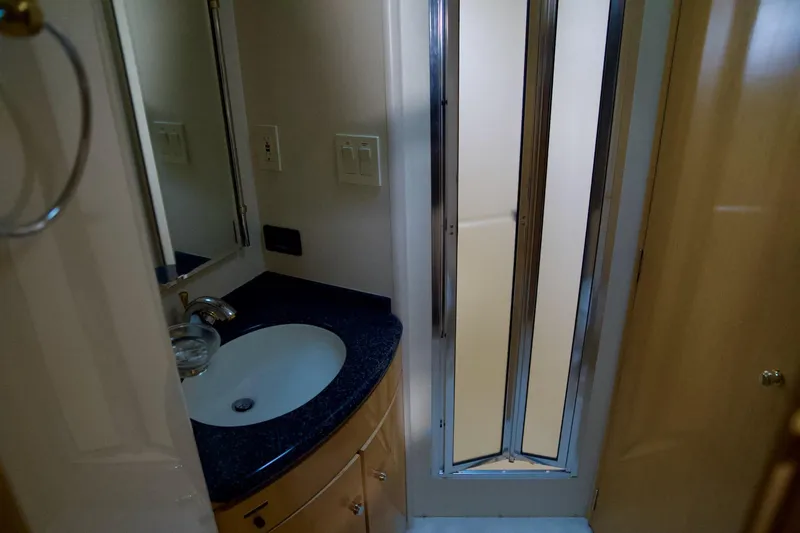 Slide: The Image of Bathroom interior of 2000 Carver 506 Motor Yacht with sink and shower. - 46