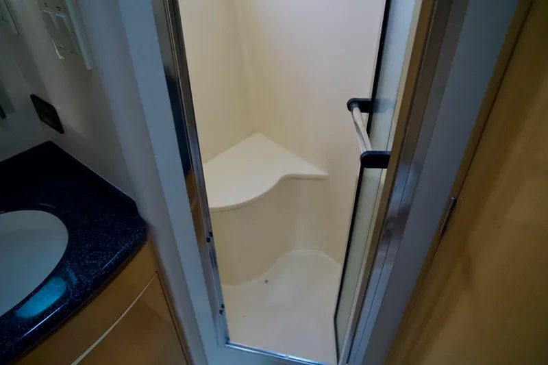 Slide: The Image of Shower area in 2000 Carver 506 Motor Yacht with glass door and corner seat. - 55