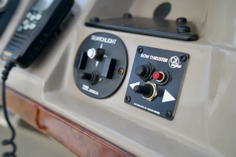 Slide: The Image of Control panel of a 2000 Carver 506 Motor Yacht featuring searchlight and bow thruster controls. - 28
