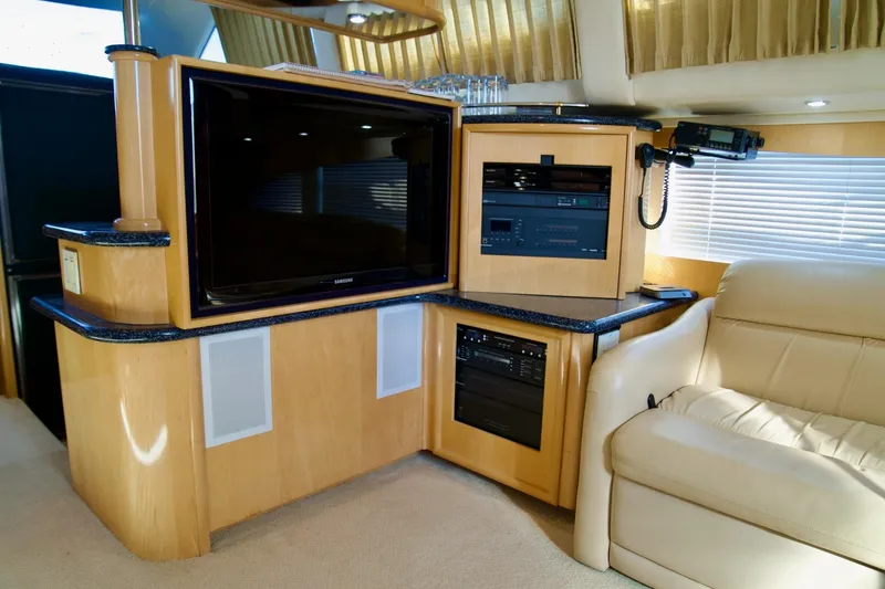 Slide: The Image of Luxurious interior of 2000 Carver 506 Motor Yacht with entertainment system and plush seating. - 35