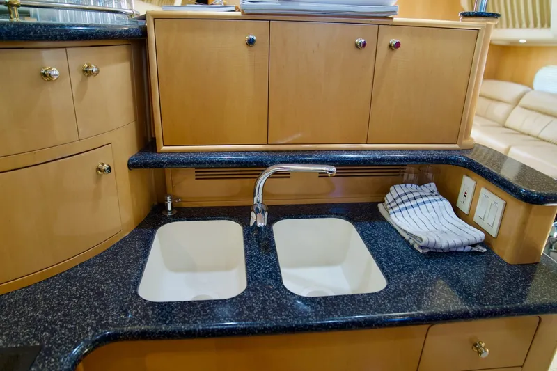 Slide: The Image of Luxurious kitchen sink area in 2000 Carver 506 Motor Yacht with dual basins. - 41