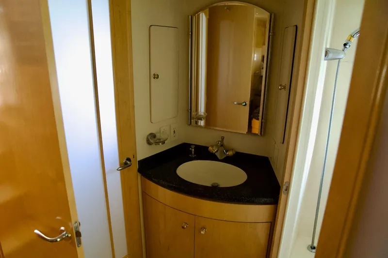 Slide: The Image of Bathroom interior of 2000 Carver 506 Motor Yacht with sink and mirror. - 44