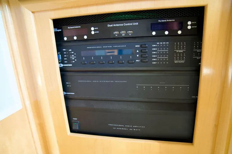 Slide: The Image of Control panel inside 2000 Carver 506 Motor Yacht, featuring dual antenna unit and audio processor. - 68