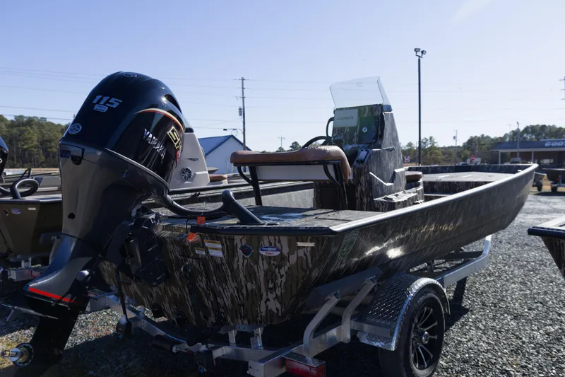 Slide: The Image of 2026 Avid 20 Rogue CC boat with Yamaha 115 engine on trailer. - 1