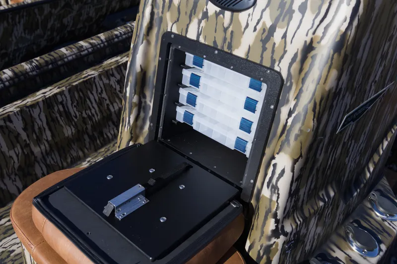 Slide: The Image of Camouflage-patterned storage compartment on 2026 Avid 20 Rogue CC boat. - 11