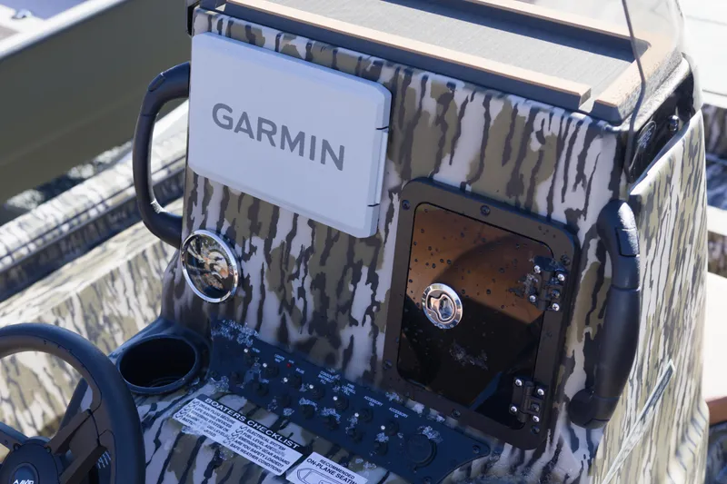 Slide: The Image of Camouflage console of 2026 Avid 20 Rogue CC boat with Garmin navigation system. - 6