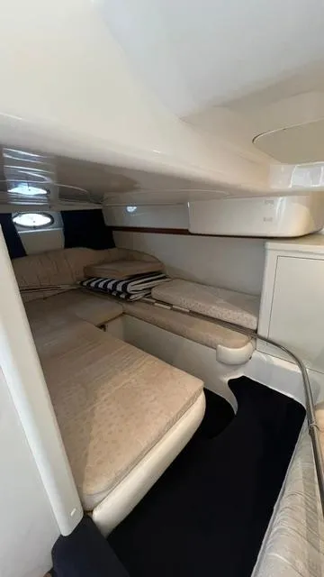 Slide: The Image of 2003 Cranchi Endurance 39 boat with cushioned sun deck at dockside. - 20