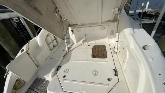 Slide: The Image of Interior of 2003 Cranchi Endurance 39 yacht with seating area and kitchenette. - 22