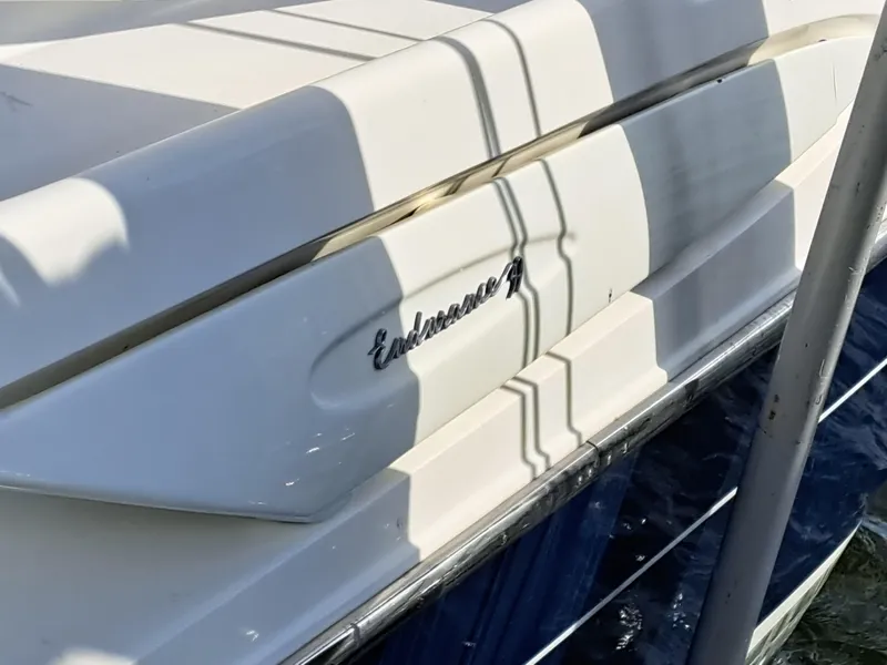 Slide: The Image of 2003 Cranchi Endurance 39 interior with kitchenette and seating area. - 24