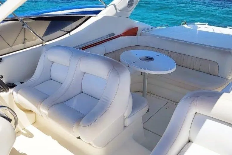 Slide: The Image of 2003 Cranchi Endurance 39 boat deck with open storage compartment. - 9