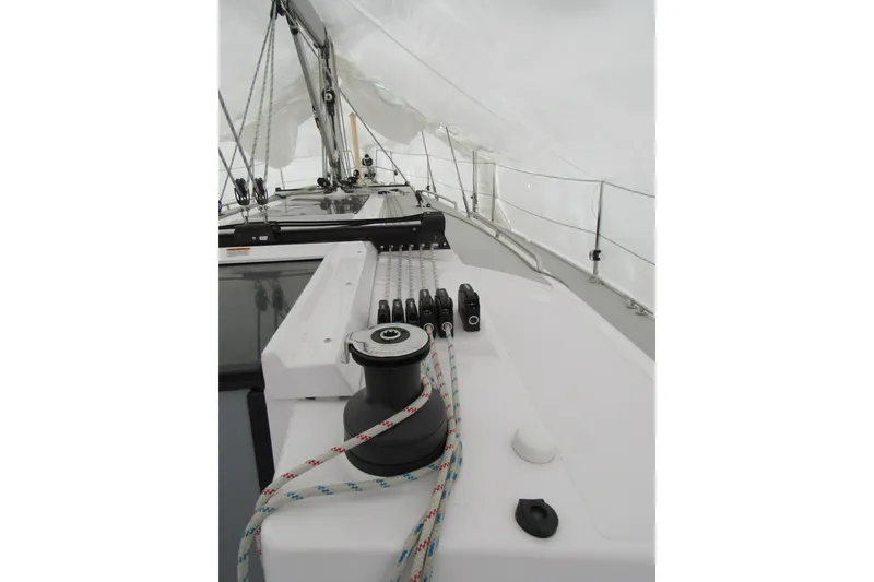 Slide: The Image of Deck view of 2019 Catalina 425 sailboat, showcasing rigging and winch system. - 12