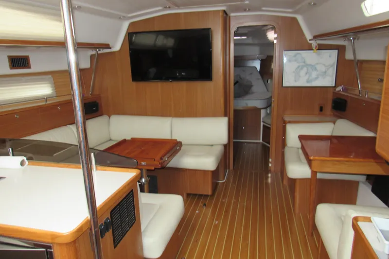 Slide: The Image of Interior of 2019 Catalina 425 yacht with modern wood finish and comfortable seating. - 23