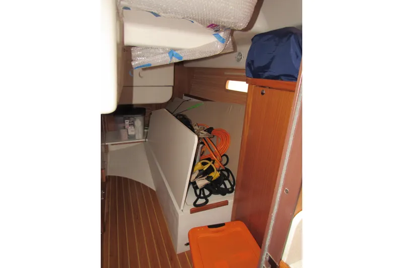 Slide: The Image of Interior of a 2019 Catalina 425 sailboat with storage and equipment. - 28