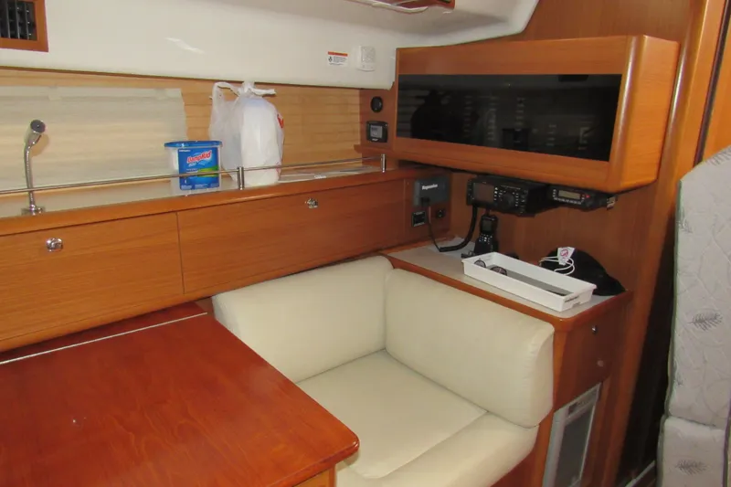 Slide: The Image of Interior of 2019 Catalina 425 yacht with wooden cabinetry and beige seating. - 31
