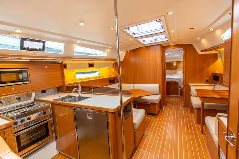 Slide: The Image of 2019 Catalina 425 sailboat in winter storage, covered and supported by stands. - 4