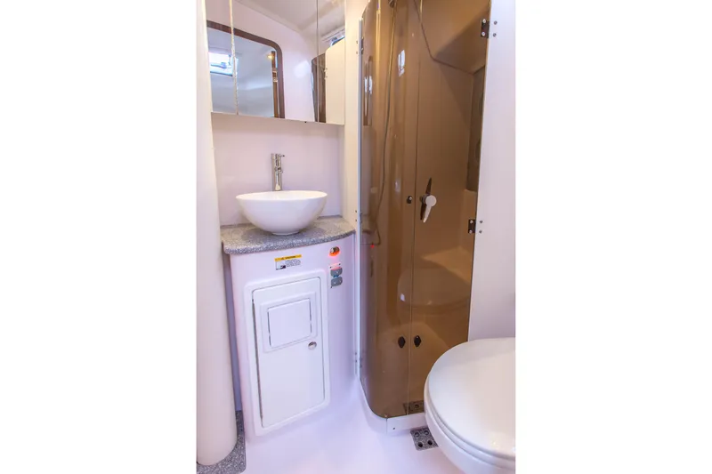 Slide: The Image of Modern bathroom in 2019 Catalina 425 yacht with sink, shower, and toilet. - 49