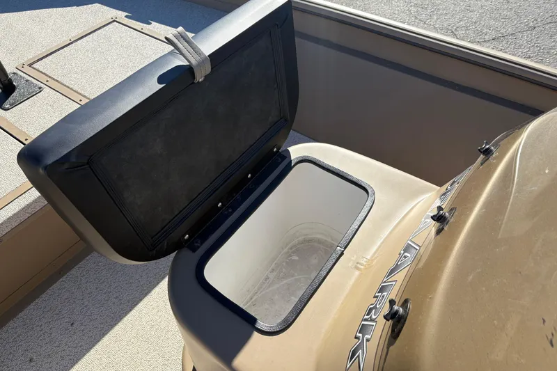 Slide: The Image of Open storage compartment on 2026 SeaArk Shadow 18 boat, showcasing interior space. - 15