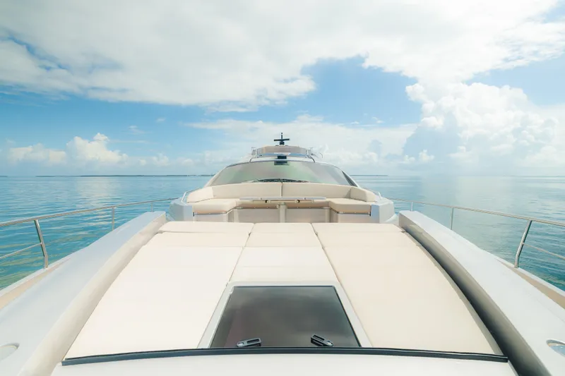 Slide: The Image of Luxurious 2021 Pershing 8X yacht cockpit with modern navigation displays and leather seating. - 14