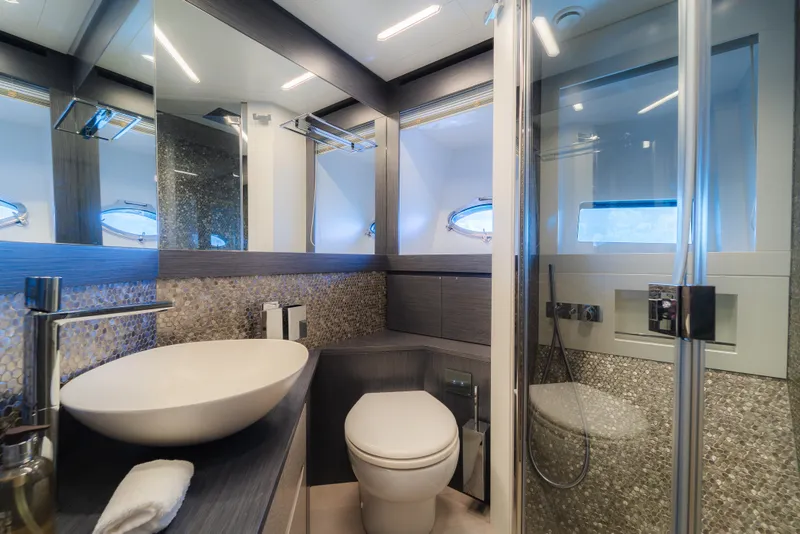 Slide: The Image of Luxurious bedroom interior of 2021 Pershing 8X yacht with modern design and skylight. - 23