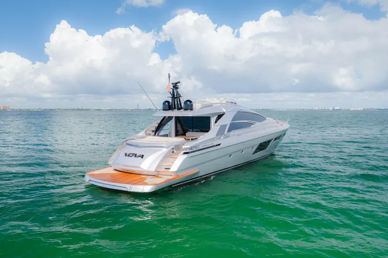 Slide: The Image of Luxurious 2021 Pershing 8X yacht cruising on vibrant blue waters. - 3