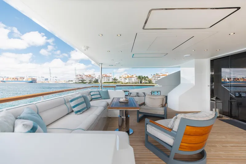 Slide: The Image of Luxurious deck of 2018 Benetti Fast 125 yacht with elegant seating and ocean view. - 12