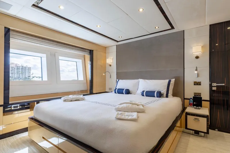 Slide: The Image of Luxurious bedroom interior on 2018 Benetti Fast 125 yacht, featuring elegant design and large windows. - 23