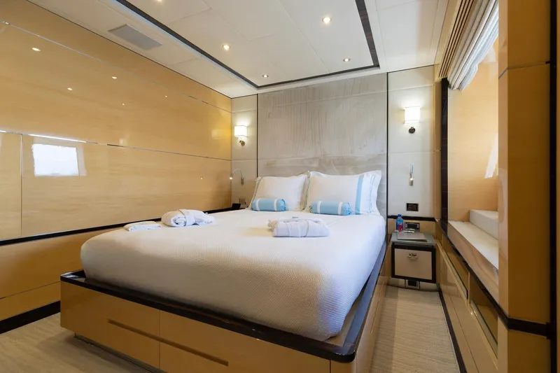 Slide: The Image of Luxurious bedroom interior on 2018 Benetti Fast 125 yacht, featuring elegant design and cozy ambiance. - 24