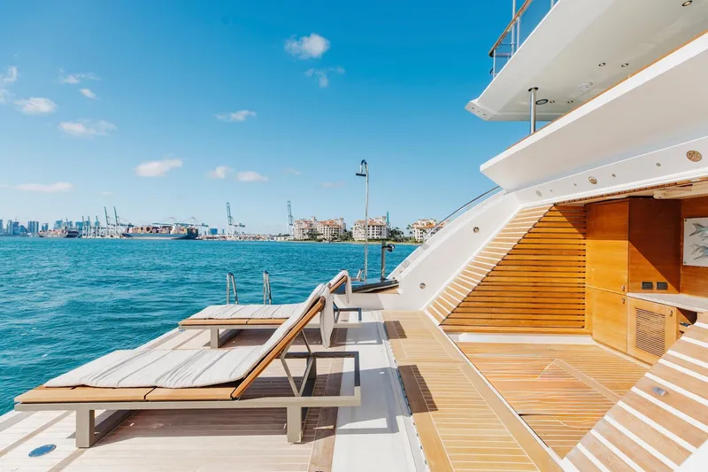 Slide: The Image of Luxurious 2018 Benetti Fast 125 yacht deck with sun loungers and ocean view. - 26