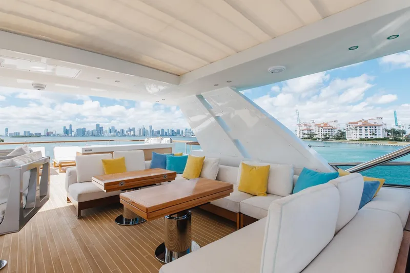 Slide: The Image of Luxurious 2018 Benetti Fast 125 yacht deck with elegant seating and ocean view. - 41