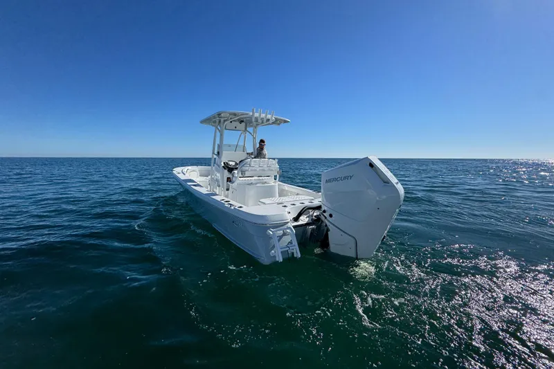 Slide: The Image of 2026 BlackJack 256 Coastal boat on open sea under clear blue sky. - 10