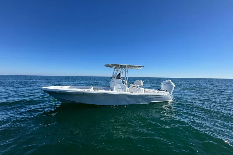 Slide: The Image of 2026 BlackJack 256 Coastal boat on open sea under clear blue sky. - 6
