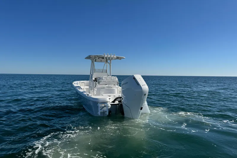 Slide: The Image of 2026 BlackJack 256 Coastal boat on open sea under clear blue sky. - 8