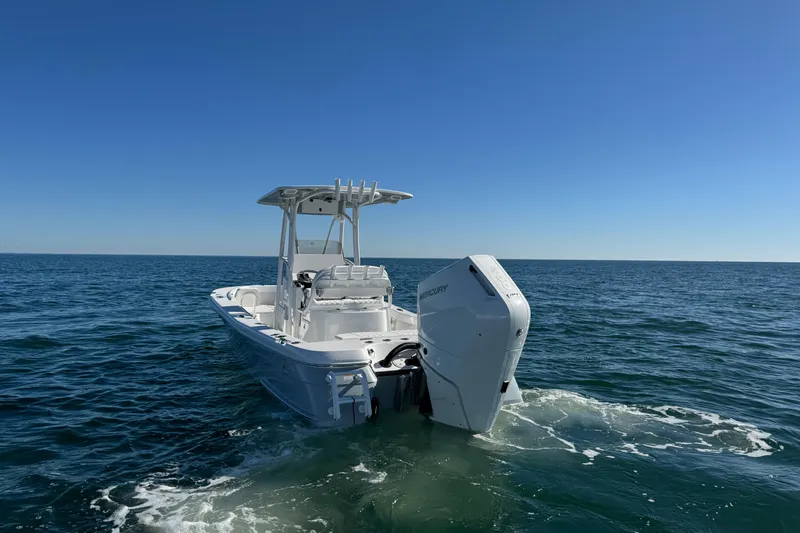 Slide: The Image of 2026 BlackJack 256 Coastal boat on open sea with clear blue sky. - 9