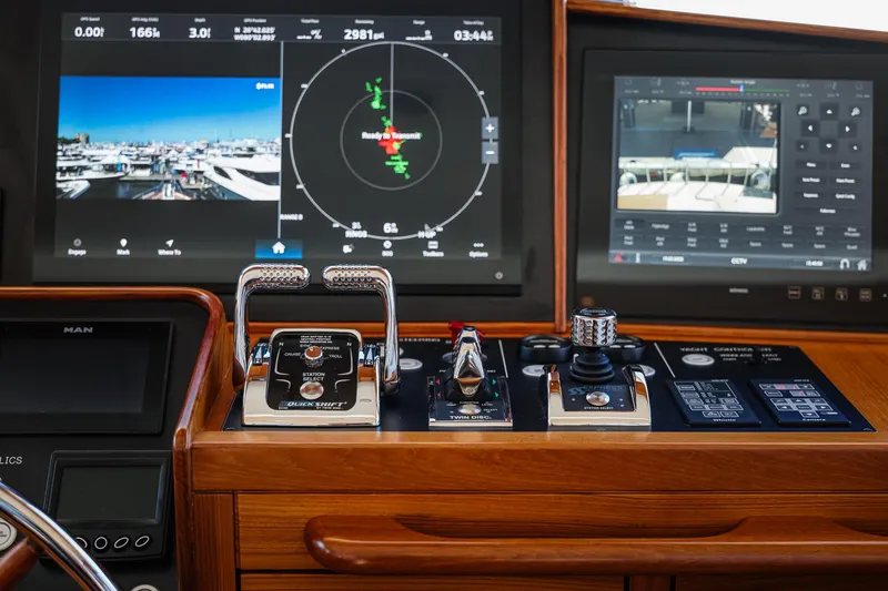 Slide: The Image of Control panel of 2027 Fleming 85 Pilothouse yacht with advanced navigation displays. - 30