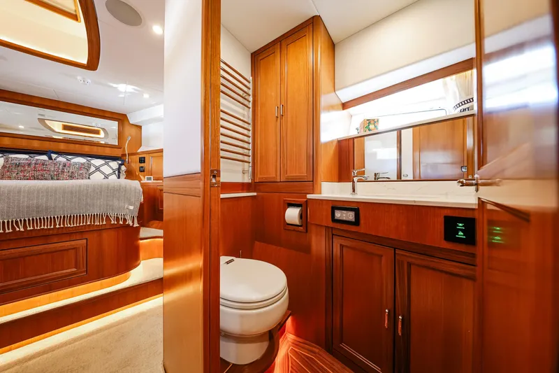 Slide: The Image of Luxurious 2027 Fleming 85 Pilothouse yacht interior with elegant wood finishes and modern amenities. - 53