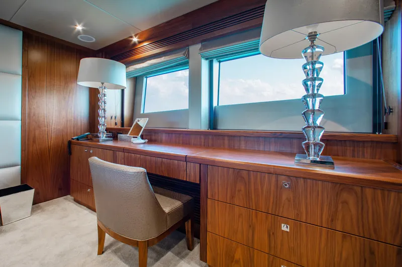 Slide: The Image of Luxurious interior of 2014 Sunseeker 131 yacht with modern furnishings and large windows. - 17