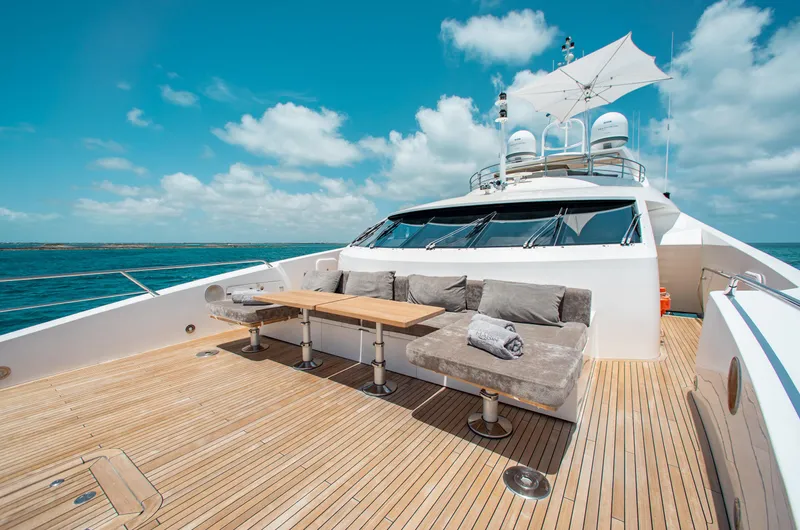 Slide: The Image of Interior of 2014 Sunseeker 131 yacht's helm station with leather seating and advanced controls. - 30